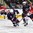 GRAND FORKS, NORTH DAKOTA - APRIL 24: USA's Ryan Lindgren #18, USA's Luke Martin #2 and Canada's Brett Howden #10 battle for the puck during bronze medal game action at the 2016 IIHF Ice Hockey U18 World Championship. (Photo by Matt Zambonin/HHOF-IIHF Images)

